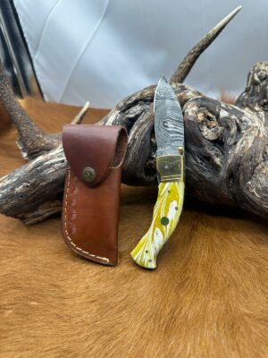 Magnifique couteau pliant avec lame en acier damas, manche en Micarta ref DM300