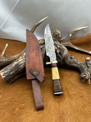 Magnifique couteau Bowie “Rite-Edge” lame acier damas manche en OS avec étui en cuir ref O41